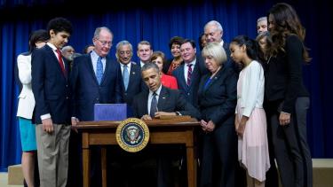 President Obama signs the Every Student Succeeds Act on December 10, 2015